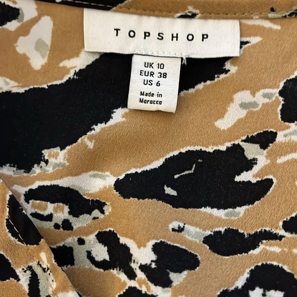 Small Women’s animal print blouse with the V-neck - Picture 4 of 4